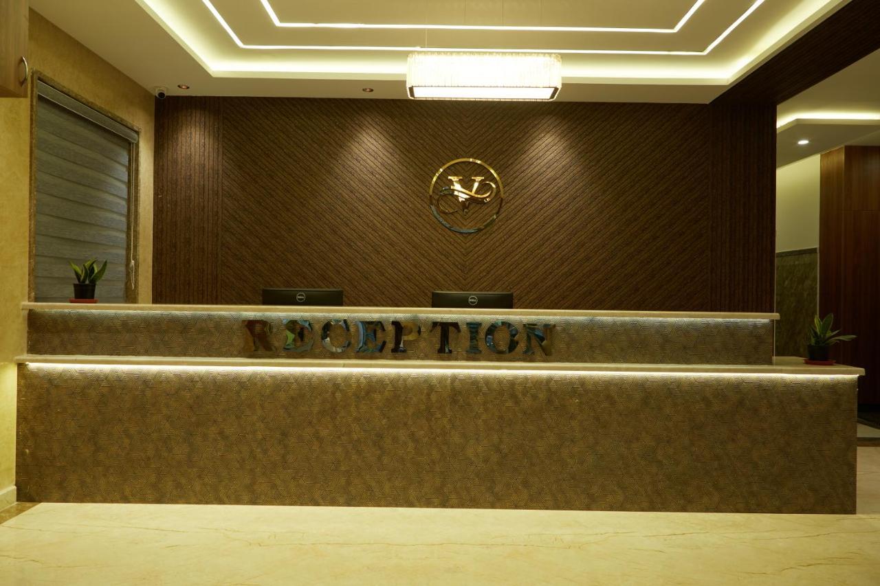 Vovo Premier Hotel Bangalore Bagian luar foto